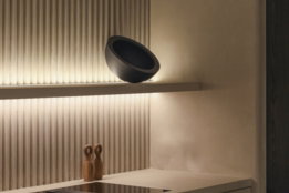 white ceramic sink beside window